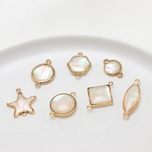 Colgantes geométricos de concha iridiscente con borde dorado para joyería DIY