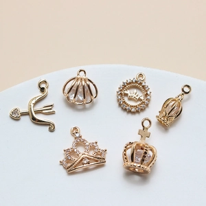 DIY jewelry 6pcs set with gold zircon pendants including crown shell and bow arrow charms