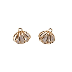 Golden shell charms with zircon inlay and hollow design for DIY jewelry making