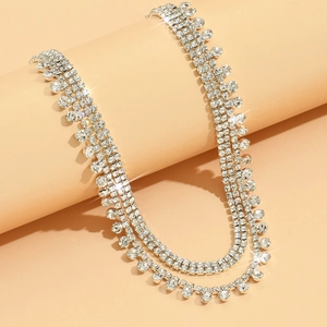 Collier ras du cou luxueux en strass argentés avec franges en cristal pour soirées