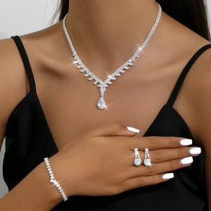 Elegant silver jewelry set with zircon pearls including necklace, earrings and bracelet