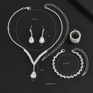 Detailed view of silver-tone rhinestone jewelry set with measurements and weights