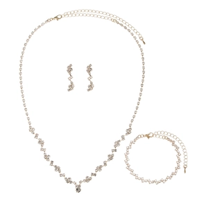 Sparkling gold-plated crystal jewelry set with wave necklace, bracelet, and drop earrings