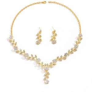 Parure de bijoux fleurie dorée avec cristaux blancs pour mariée, collier et boucles