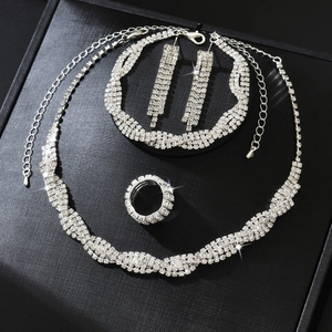 Elegantes 4-teiliges Brautschmuck-Set mit funkelnder Strass-Halskette und Ohrringen