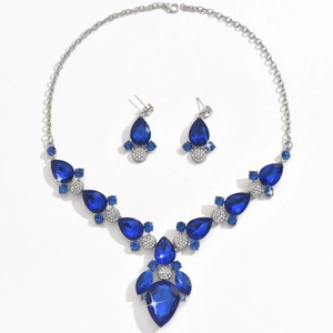 Set di gioielli con cristalli blu scuro a forma di pera e collana argentata con orecchini
