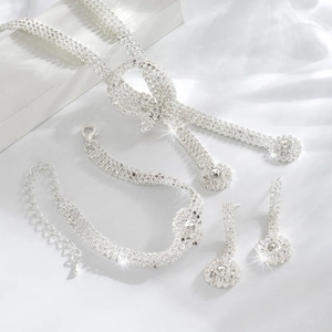 Sparkling silver bow jewelry set with crystal necklace, bracelet and earrings for women