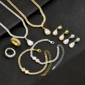 Sparkling bridal jewelry set with rhinestone necklace and drop earrings in gold and silver