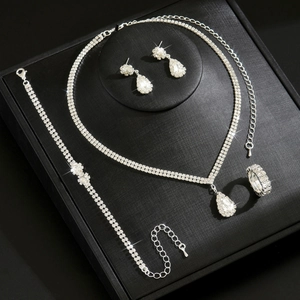 Luxurious bridal jewelry set with water drop pendant necklace, earrings, bracelet and ring