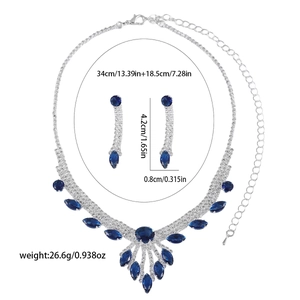 Parure bijoux de mariée avec cristaux goutte bleu marine et collier argenté scintillant