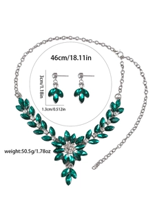 Detail view of emerald crystal flower necklace and earrings set with exact dimensions