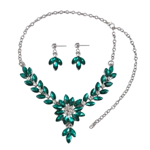 Silver flower jewelry set with emerald green gems and rhinestones for brides