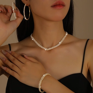 Luxury gold plated jewelry set for women with shimmering crystals and large hoop earrings