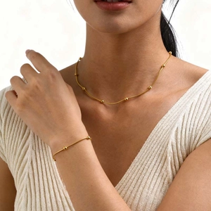 Minimalist 18K gold snake chain necklace and bracelet set with round gold beads for women