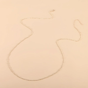 Chaîne de corps dorée chic avec perles et fermoir mousqueton réglable pour bikinis d'été