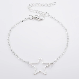 Minimalist silver chain bracelet featuring a hollow star pendant and lobster clasp closure