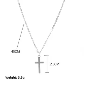 Minimalist silver cross necklace with a 45cm chain and 2.5cm pendant length