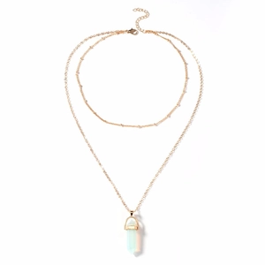 Detail view of double-layer gold necklace featuring a hexagonal opal crystal pendant