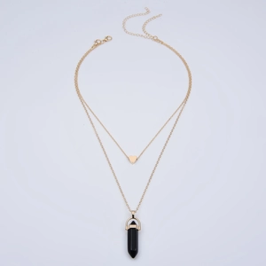Double-layered golden necklace with heart pendant and black hexagonal stone crystal prism