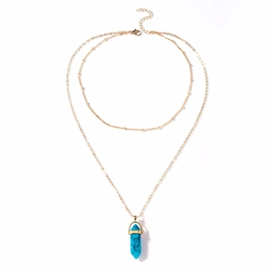 Detail of double-layered gold chain with turquoise hexagonal prism crystal pendant