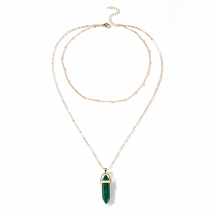 Close-up of gold double-layer necklace featuring a green hexagonal malachite stone pendant