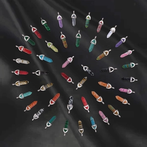 Hexagonal crystal quartz point pendants in diverse natural stones with silver metal caps