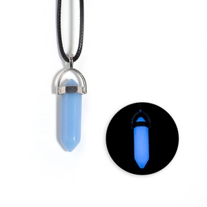 Glow-in-the-dark blue hexagonal crystal pendant necklace with black cord and silver clasp