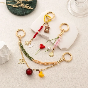 Colorful DIY acrylic chain keychain with cute brown bear and heart charms for bags
