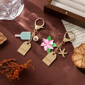 Summer Resort Style Alloy Enamel Keychain Gold Plated Starfish Flower Pickleball Racket Bag Pendant Jewelry For Women