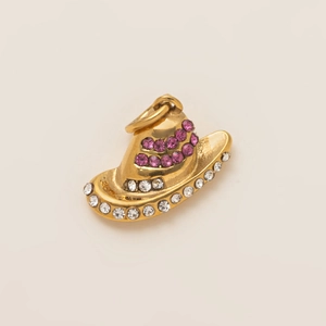 Macro view of 18K gold plated cowboy hat pendant with pink and white rhinestones