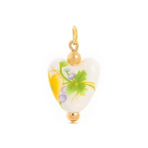 Heart-shaped ceramic pendant with colorful floral patterns and golden accents