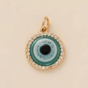 Pendentif œil porte-bonheur minimaliste doré avec des pierres de zircon blanc brillant