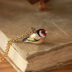 Pendente volpe minimalista in acciaio inossidabile placcato oro 18K su libro vintage