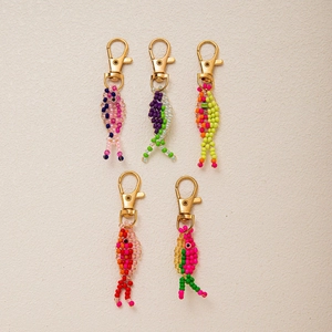 Set of five colorful handmade beaded fish keychains with golden metal lobster clasps