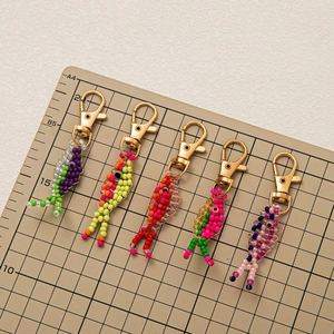 Handmade colorful beaded fish keychains with gold lobster clasps in 5 vibrant colorways