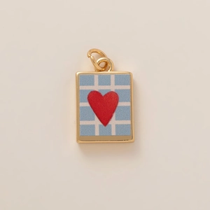 Blue and white checkered rectangular pendant with a red heart and golden finish