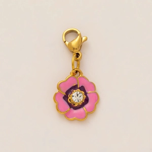 Detailed close-up of a pink and purple floral enamel pendant with a lobster clasp