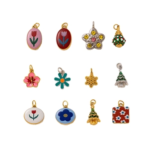 Mix of 12 stainless steel floral and holiday charms with enamel and crystal details
