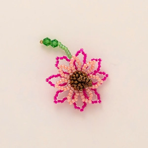 Handmade beaded flower pendant with pink petals and green leaf stem accessories