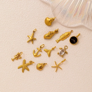 Gouden 18K vergulde roestvrijstalen oceaanbedels voor DIY sieraden met zeesterren en schelpen