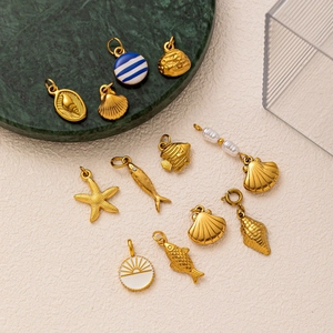 18K gold plated stainless steel ocean charms featuring sea shells and pearls