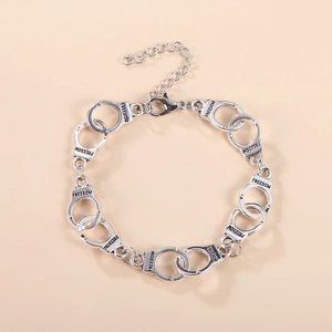 Retro silver handcuff link bracelet with FREEDOM engraving and adjustable lobster clasp