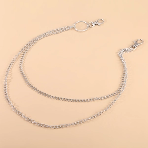 Detail of silver double-layered punk waist chain with lobster clasps and metal ring
