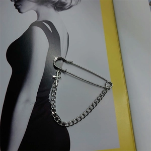 Cool punk style silver metal safety pin brooch with cross chain and vintage charm