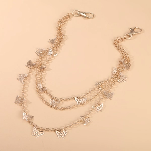 Three-layer gold butterfly waist chain with metallic hollow pendants and lobster clasps