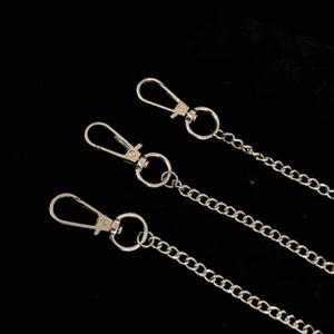 Three-layer silver metal hip-hop pants chains with sturdy spring hooks on black background