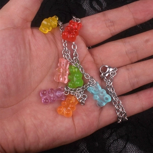 Colorful resin bear pendant necklace set with silver metal chain in seven vibrant shades