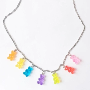 Fashionable necklace featuring seven colorful translucent resin gummy bear pendants on silver chain