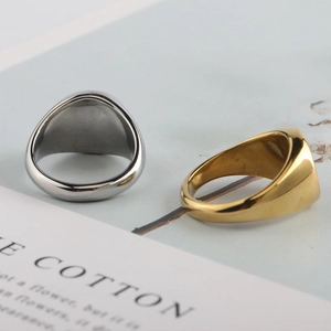 Polished stainless steel signet rings in gold and silver finish for a trendy unisex look