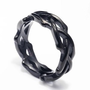 Detailed view of the black twisted rope texture on this stainless steel ring band